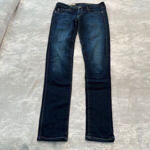 AG womens Super Skinny size 27R blue jeans.